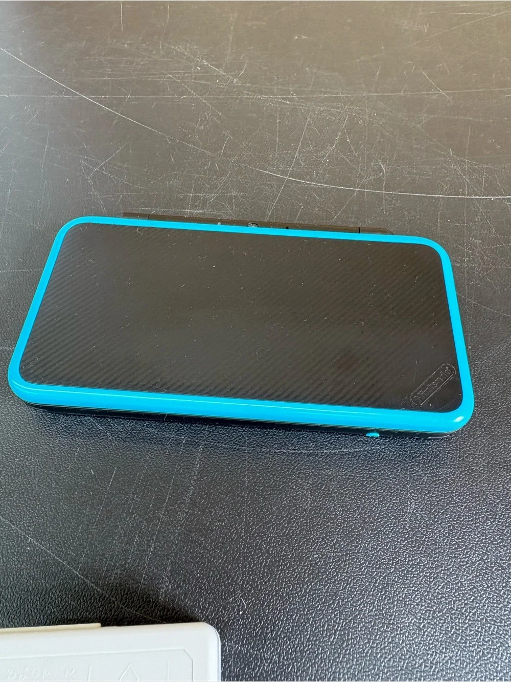 Nintendo 2DS XL Handheld Console - Black with Turquoise Buttons